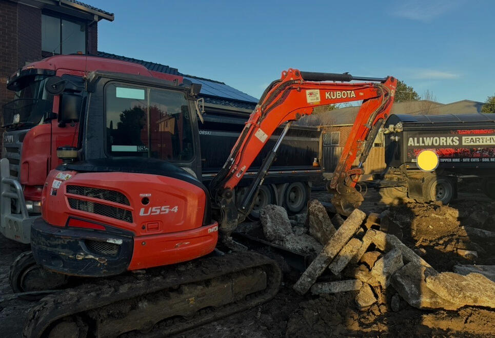 Twin Excavators on Site – All Equipped Plant Hire Two excavators working together on a construction site.